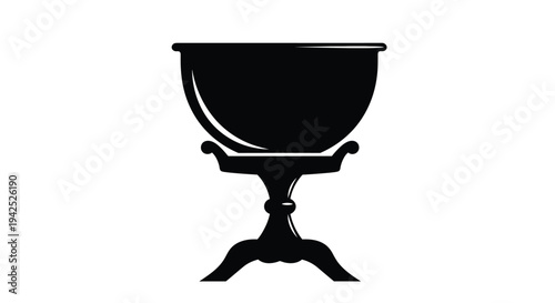 A stark black silhouette of an ornate stemmed chalice or goblet