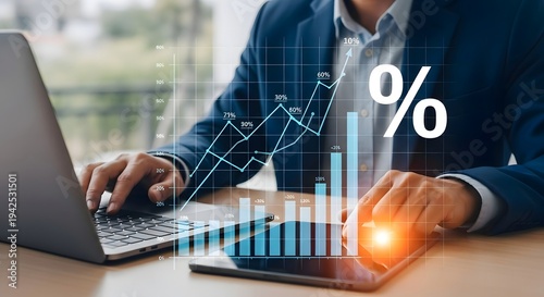 Analyzing financial growth charts and data on laptop for business investment strategy plan