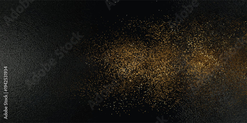Abstract golden particles shimmering on a dark background creating a dynamic and mysterious visual effect.
