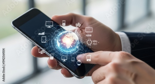 Hand of Businessman Holding Computer and Devices Displayed on Smartphone Interface with International Network