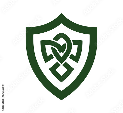 A green shield logo with a Celtic knot design on a white background