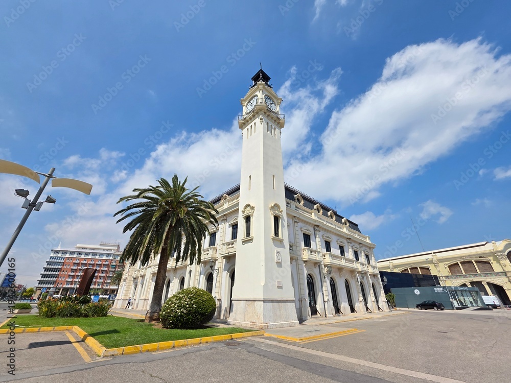 Fototapeta premium view of Edifici del Rellotge ( Clock Building) a historic landmark built in 1916, located in the port of Valencia