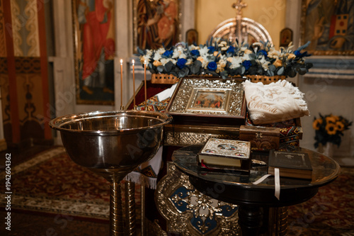 Quadro em tela Traditional ceremonial setup with silver bowl and books in elegant classic inter