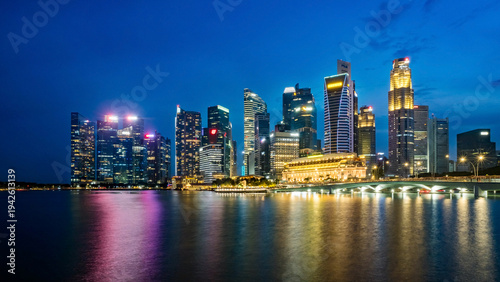 Wallpaper Mural Beautiful Singapore cityscape at dusk, iconic Marina Bay landmarks at night. Torontodigital.ca