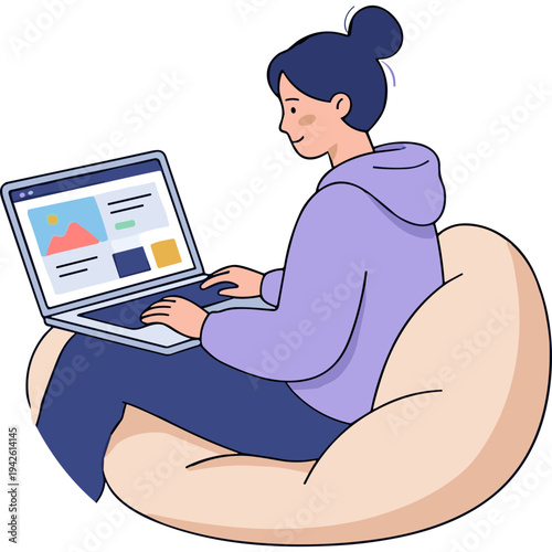 Woman sits on beanbag chair working on laptop with graphics on screen