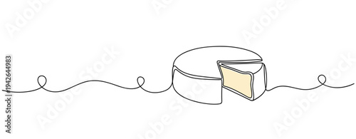 Cheese wheel sliced showing wedge on minimal background