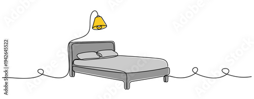 Bed positioned under lamp in minimalist white background
