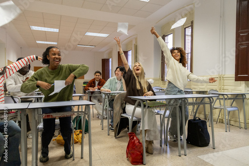 Happy diverse students celebrating end of school year