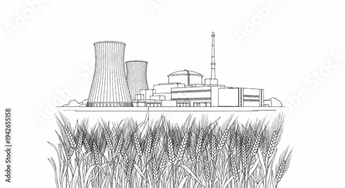 Industrial power plant with cooling towers towers next to a wheat field