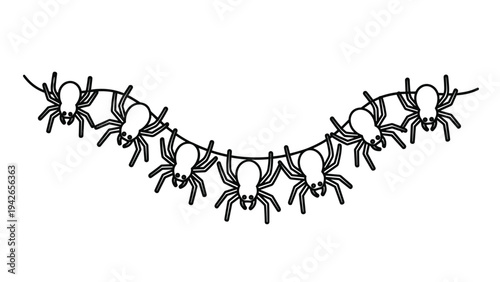Spooky Halloween decoration featuring a banner of black and white spiders hanging from a thin string for festive party themes.
