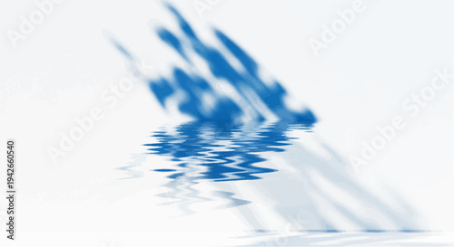 Abstract blue shapes reflected in rippling water surface