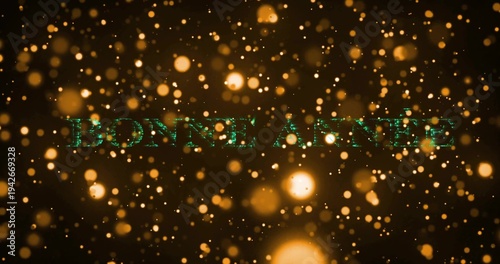 Glowing textured green BONNE ANNEE letters floating on studio backdrop, golden bokeh and lens glow