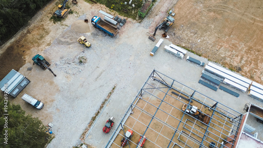 Fototapeta premium New commercial structure being built near road