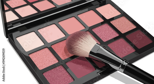 A makeup palette with a brush rests on a white surface, shades of pink