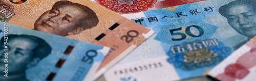 Wallpaper Mural Chinese yuan money bills pile on table. China banknotes of CNY currency close up. Torontodigital.ca