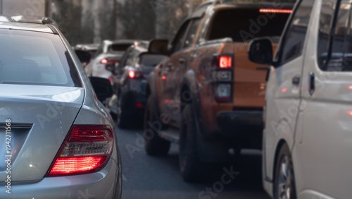 Wallpaper Mural Heavy traffic jam with crowded cars and a pickup truck on a city street during daytime. Urban congestion and transportation challenges in a busy metropolis like Bangkok Thailand. Torontodigital.ca