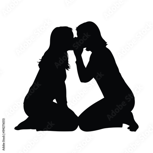 Tender moment of two women sharing a gentle kiss