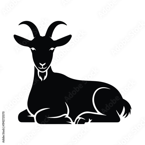 Black goat silhouette lying down peacefully