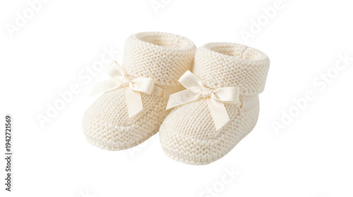 A pair of baby booties with bows on the front isolated on transparent background