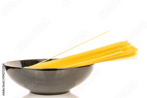 Photography Uncooked spaghetti isolated on white background, close-up.