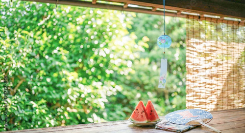 縁側の風鈴とスイカの夏風景