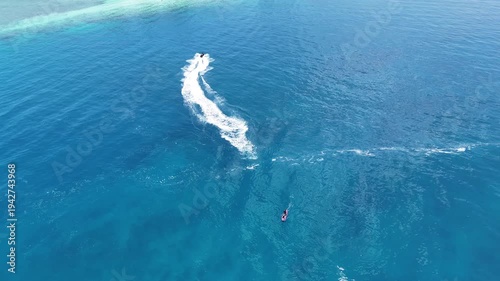 Wallpaper Mural Aerial Drone View of Jet Ski and Stand Up Paddleboard in Clear Ocean Water Torontodigital.ca