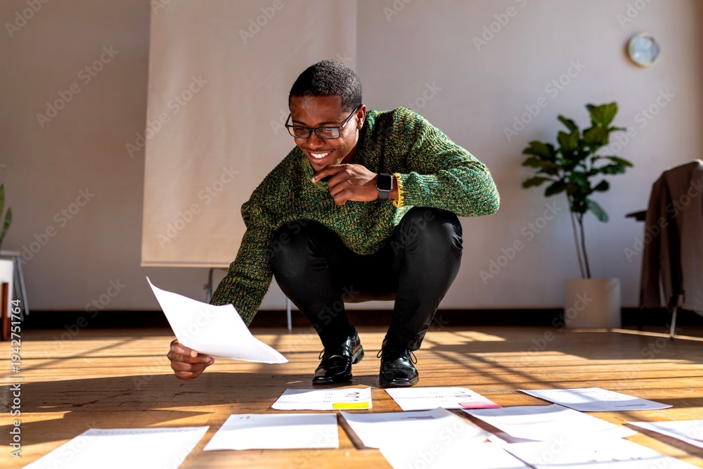 Fototapeta premium Creative professional reviewing documents.