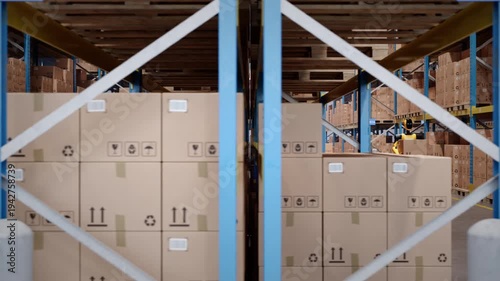 Wallpaper Mural Pan along a fully automated warehouse with AI-powered humanoid robots and agv robots transporting cardboard boxes. Future of industrial warehouse automation and AI robotics. 3d animation rendering Torontodigital.ca