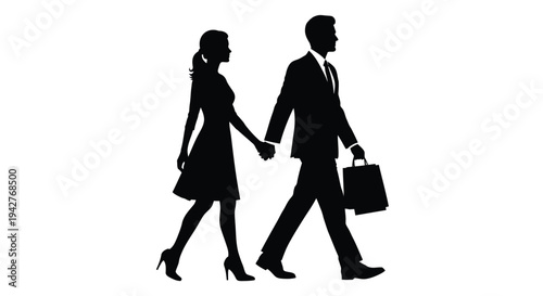 Silhouette of a couple walking together holding hands in business attire