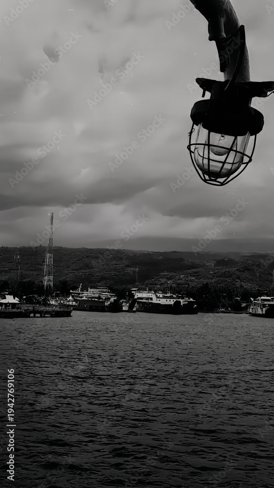 Fototapeta premium Moody Dockside Under Cloudy Skies