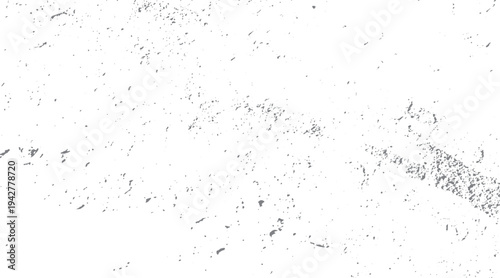 Grey speckle texture on white background with rough surface detail and scattered particles