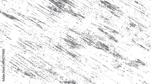 Grey diagonal scratches and speckles on a white background texture grunge abstract
