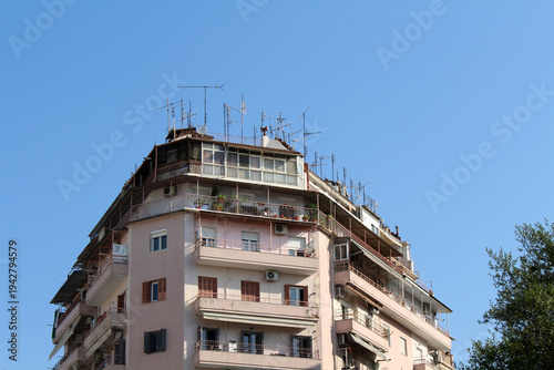 Residential apartment building Thessaloniki August 2024 Modern facades and antennas