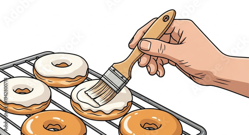 Hand Glazing Donuts on Rack.