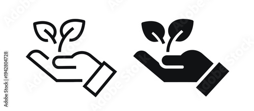 Hand holding plant sprout representing growth investment nature and development concept