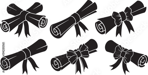 Illustration of rolled up scrolls with ribbons tied around them