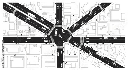 Aerial view of a complex city intersection with multiple roads and traffic.