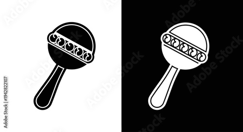 Black and white maraca musical instrument.