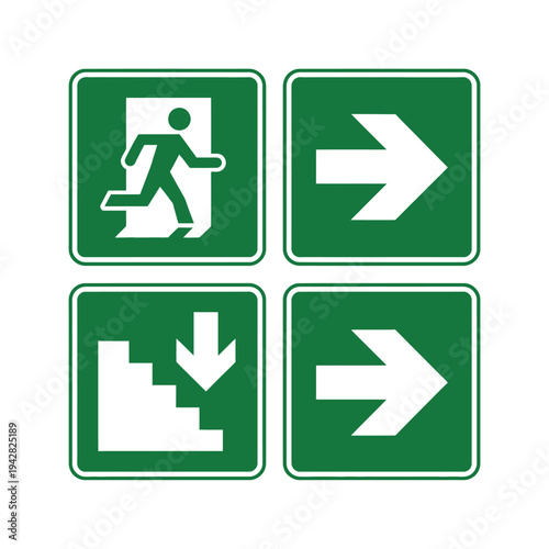 A set of green and white emergency exit signs on a wall