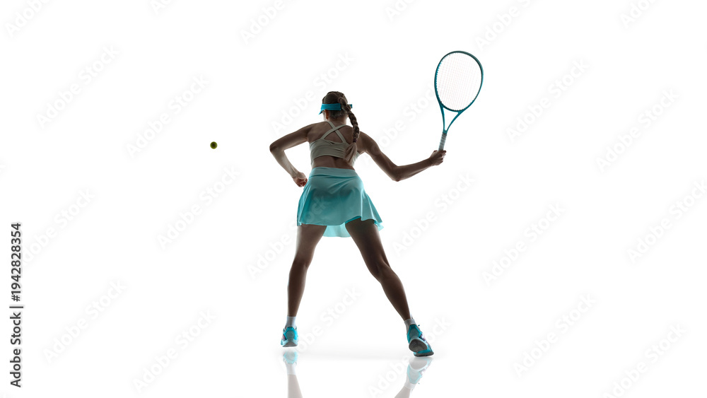 Obraz premium Female tennis player mid air movement during intense play isolated on white. Concept of high intensity training, athletic performance focus, strength and control, game day energy.