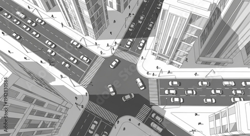 Aerial View of Busy City Intersection with Traffic and Buildings.