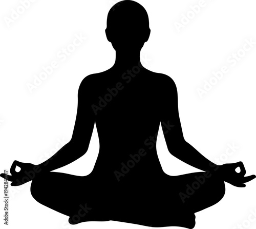 A person meditates peacefully in a serene environment sitting cross-legged