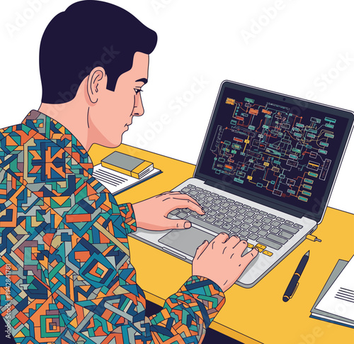 Man working on laptop computer with colorful shirt.