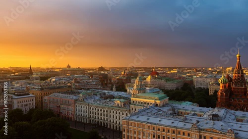 Red Square with St. Basil's Cathedral and Kremlin walls in Moscow cityscape during early morning twilight