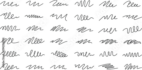A collection of blurry black signatures on a white background