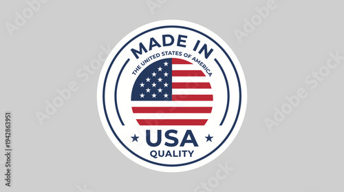 Clean circular sticker proudly declares 'Made in USA Quality' surrounding a clear depiction of the United States flag on a neutral backdrop.