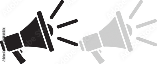 Two contrasting megaphone icons representing announcement and communication symbols in silhouette style