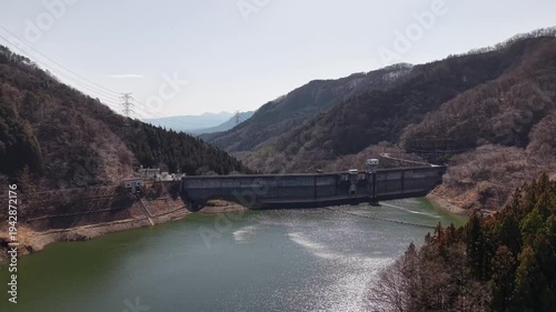 Wallpaper Mural Drone flying over mountain dam and lake in March, rural Japan landscape Torontodigital.ca