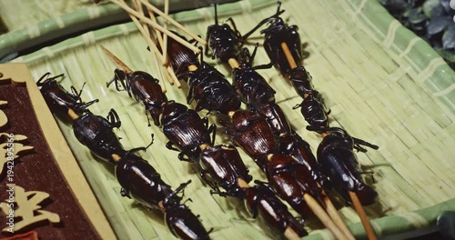 Chengdu, Sichuan, China. Fried Bugs. Cooked Insects Thread On Skewers Various Cooked Insects Thread On Skewers. Crispy Insects Popular Sichuan Snack Cheap High Protein Street Food Low Fat. Cooked Bugs