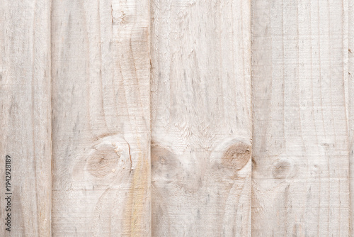 Light wooden plank texture background with natural grain and knots, rustic wood surface pattern